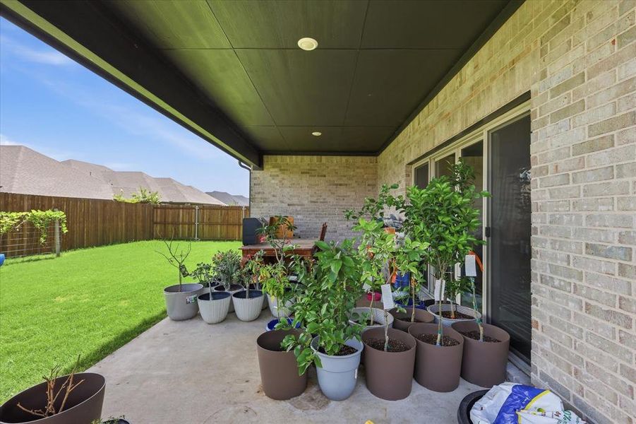 Exterior details and patio area of a home in Stonehaven, Seagoville (Image 23).