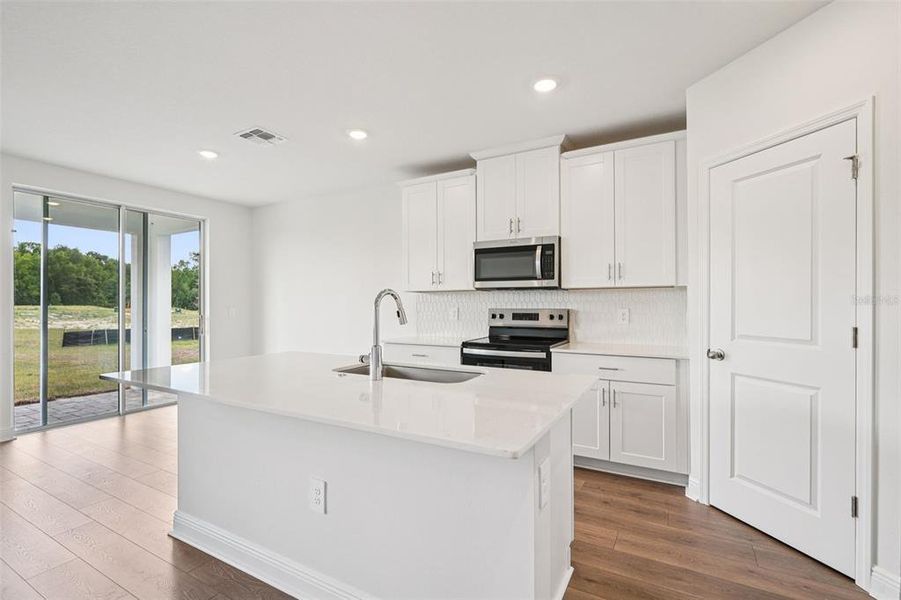 Furnished interior view inside a new home in The Reserve at Hammock Oaks - Signature Series, Lady Lake (Image 5).