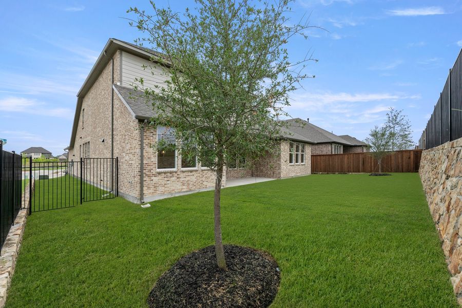Exterior details and patio area of a home in Nelson Lake Estates, Rockwall (Image 3).