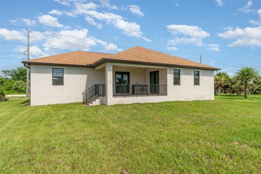 Front exterior of a new home in , Port Charlotte, FL, highlighting curb appeal (Image 18). Front exterior of a new home in , Port Charlotte, FL, highlighting curb appeal (Image 18).