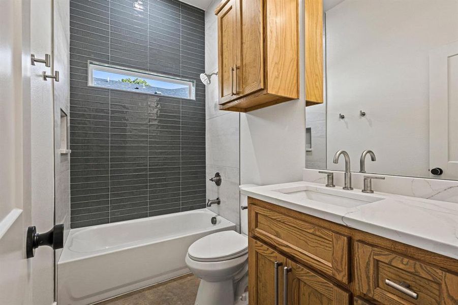 Primary 2 full bathroom, private to bedroom with vanity and tub / shower combination