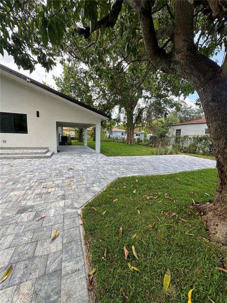Front exterior of a new home in , Miami, FL, highlighting curb appeal (Image 36).