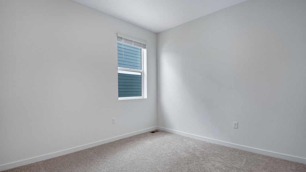 Spacious, unfurnished interior of a new home in Trails at Crowfoot, Parker (Image 21).