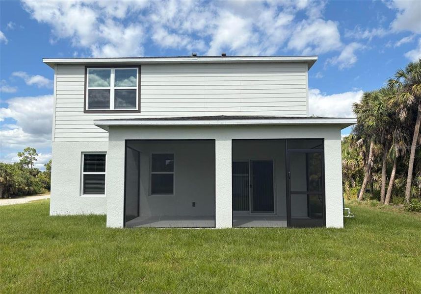 Exterior details and patio area of a home in North Port, North Port (Image 2).