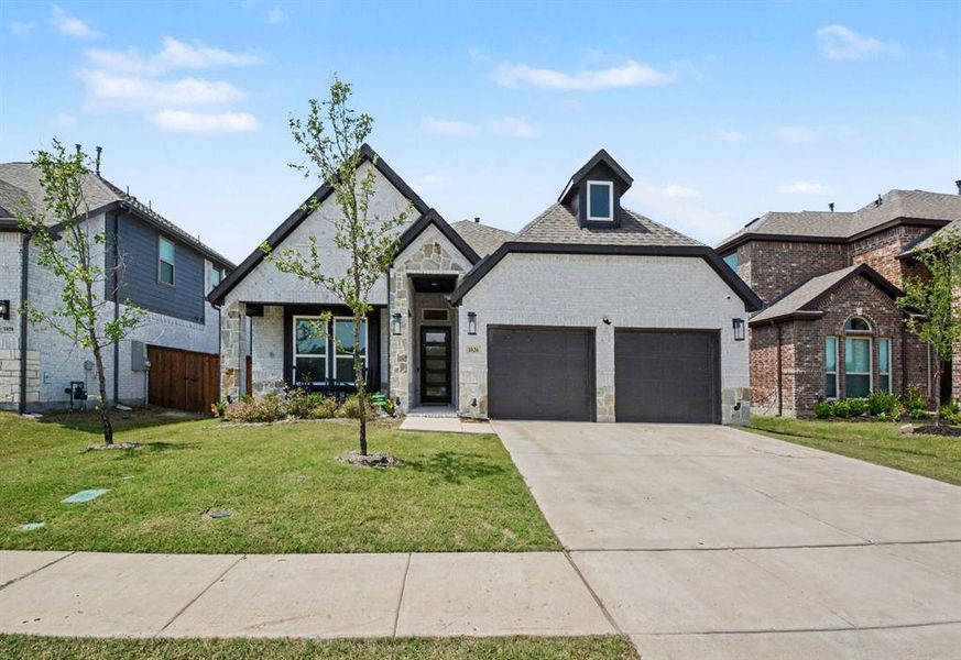Front exterior of a new home in , Forney, TX, highlighting curb appeal (Image 22).