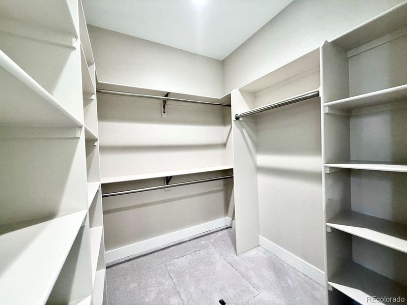 Primary Walk-in Closet Primary Walk-in Closet