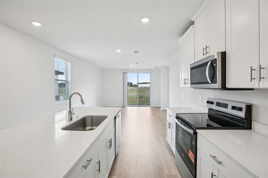 Furnished interior view inside a new home in Villamar - Classic Series, Winter Haven (Image 8).
