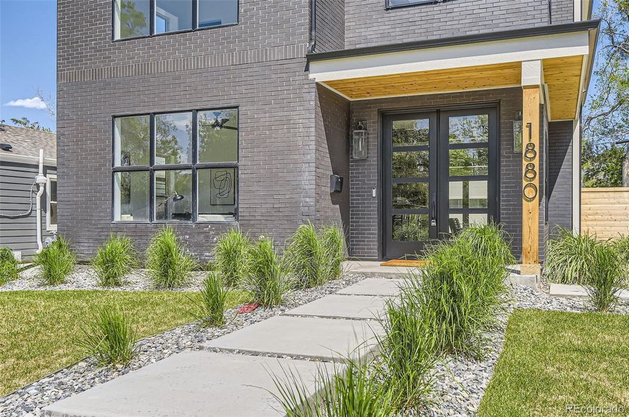 Front exterior of a new home in , Denver, CO, highlighting curb appeal (Image 29).