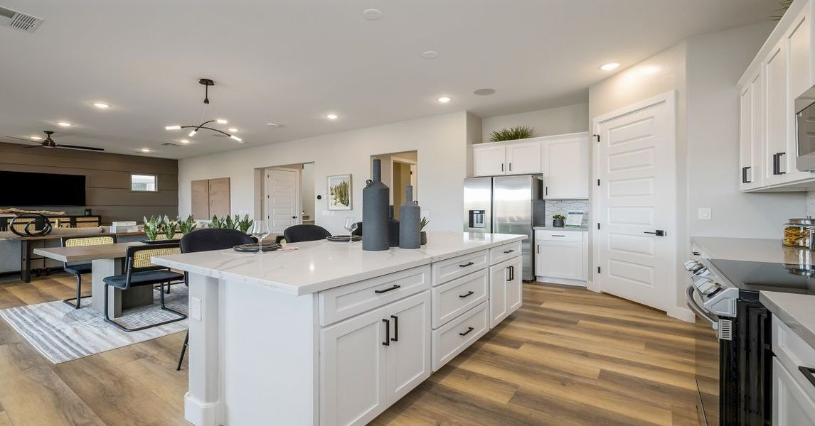 Representative furnished interior of a home built from the Camelback by William Ryan Homes in Alta Vida at Westpark, Buckeye (Image 13).