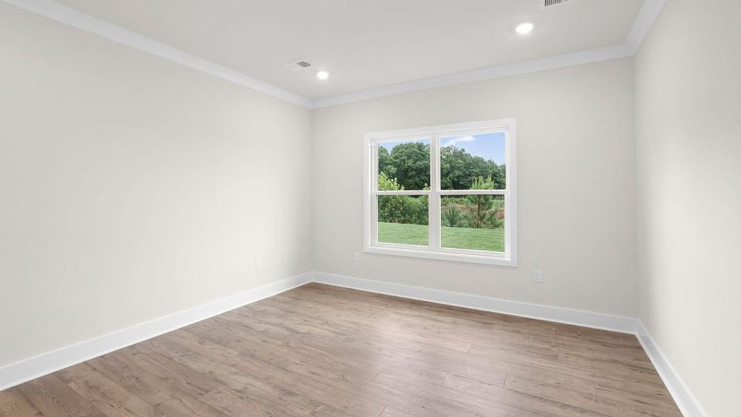 Spacious, unfurnished interior of a new home in Adams Glen, Greenville (Image 24).