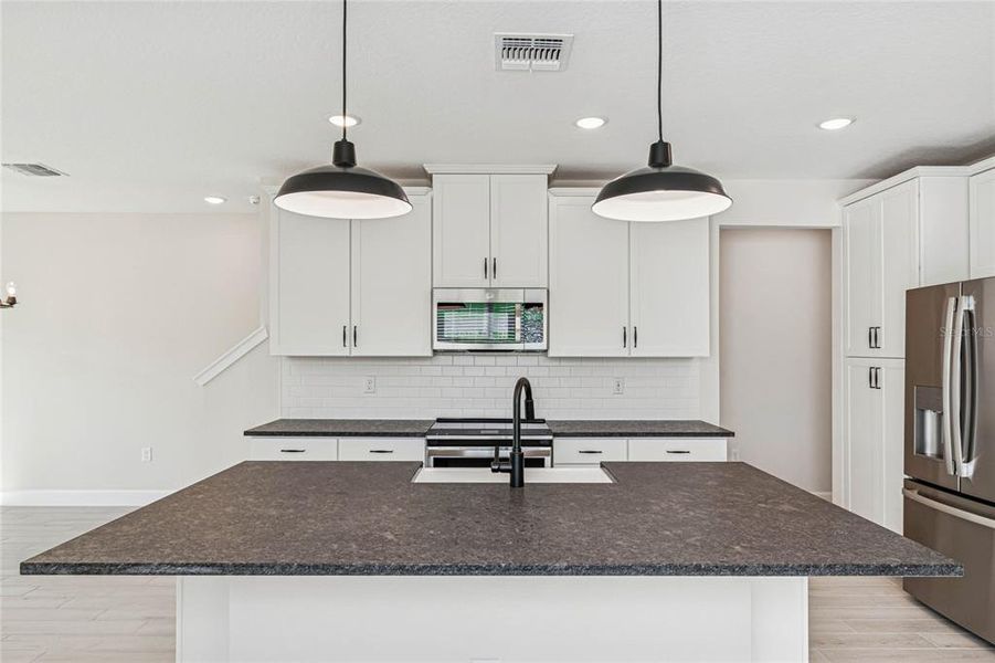 Furnished interior view inside a new home in Aspire at Canter Creek, Davenport (Image 10).
