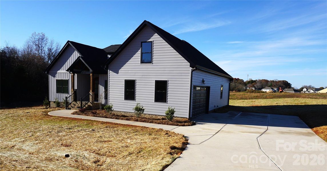Front exterior of a new home in , Salisbury, NC, highlighting curb appeal (Image 28).