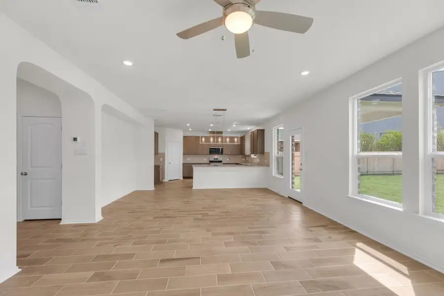 Spacious, unfurnished interior of a new home in Mustang Valley, Manor (Image 21).