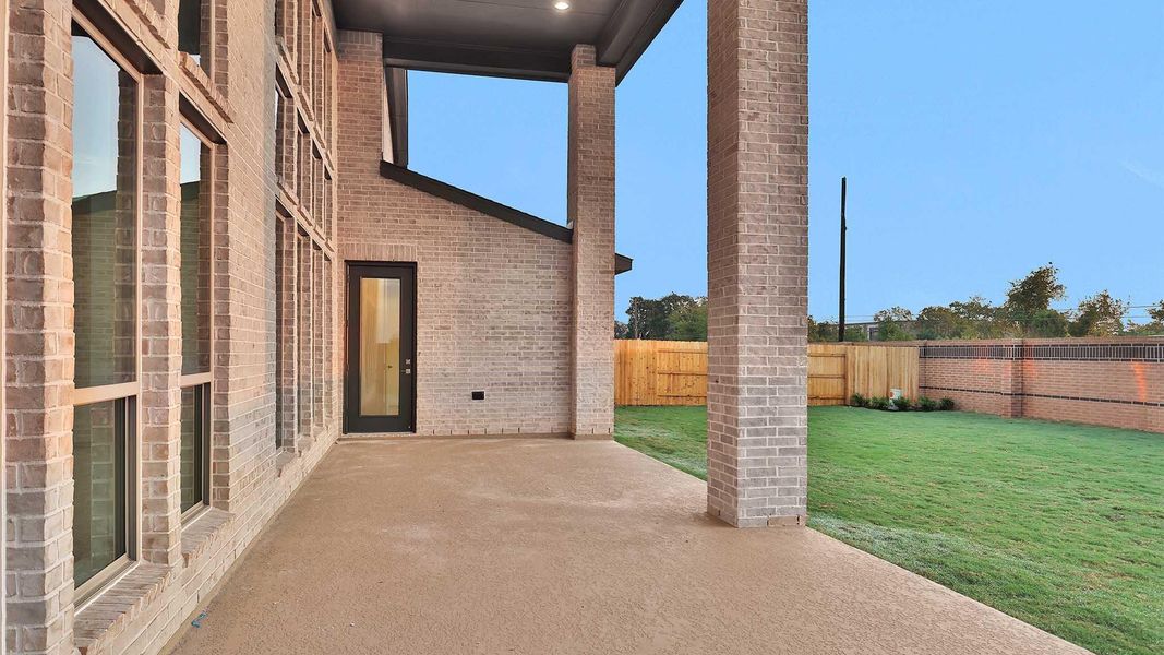 Exterior details and patio area of a home in Elyson 70', Katy (Image 4). Exterior details and patio area of a home in Elyson 70', Katy (Image 4).