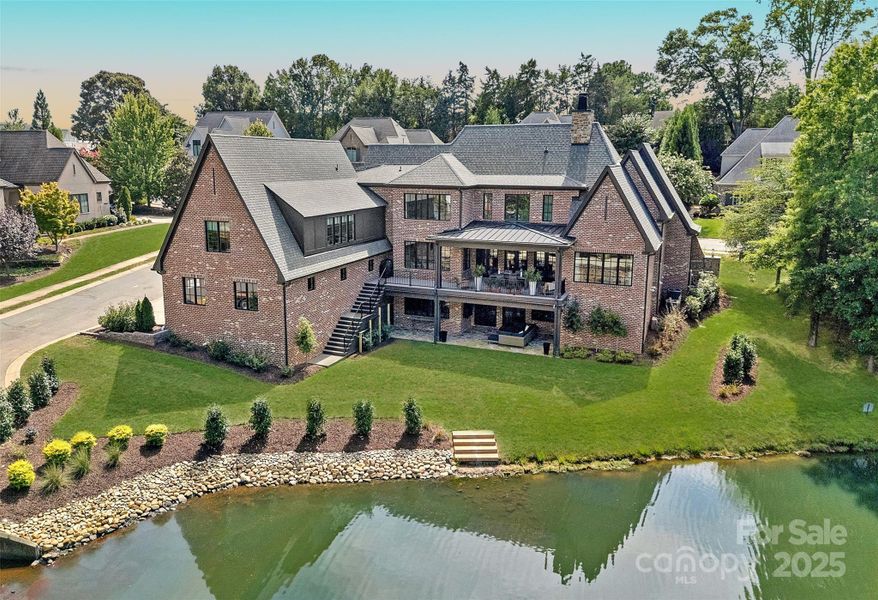 Front exterior of a new home in , Cornelius, NC, highlighting curb appeal (Image 18). Front exterior of a new home in , Cornelius, NC, highlighting curb appeal (Image 18).