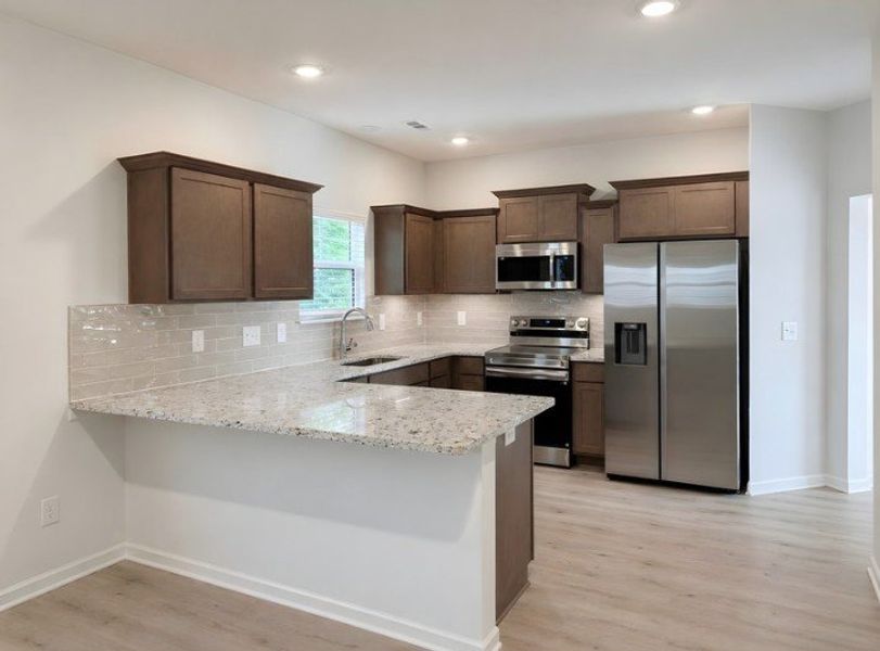 Furnished interior view inside a new home in Wheatfield, Shelbyville (Image 3).