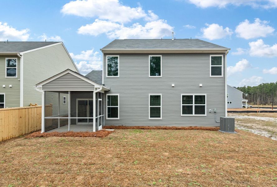 Exterior details and patio area of a home in Oakley Pointe, Moncks Corner (Image 24).