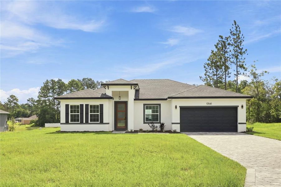 Front exterior of a new home in , Ocala, FL, highlighting curb appeal (Image 22).