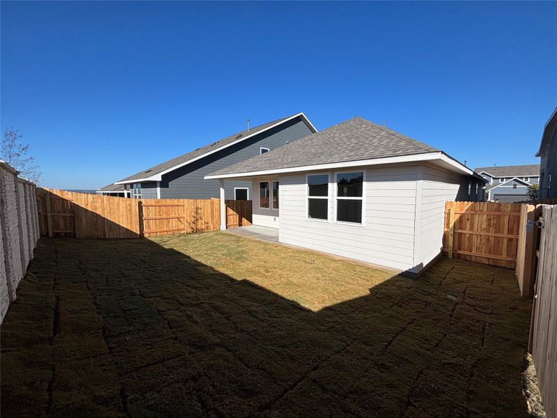 Exterior details and patio area of a home in Cannon Ranch 40s, Dripping Springs (Image 22).