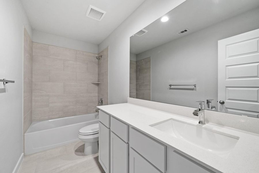 Furnished interior view inside a new home in Grand Oaks Village, Houston (Image 10).