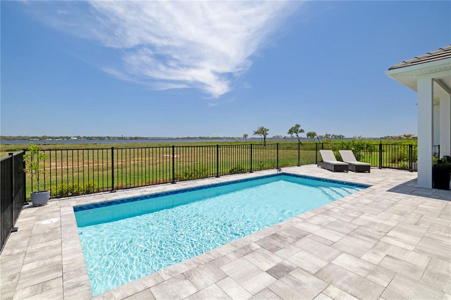 Exterior details and patio area of a home in , Palmetto (Image 27).