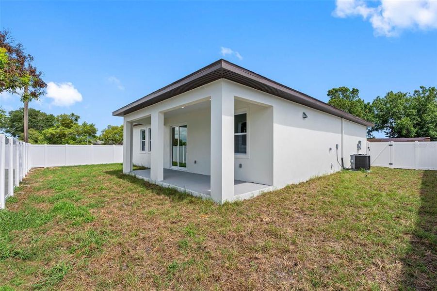Exterior details and patio area of a home in , Port Richey (Image 3).