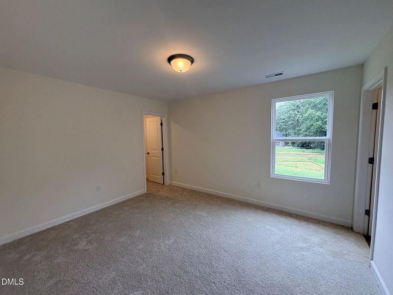 Spacious, unfurnished interior of a new home in Woodland Crossing, Zebulon (Image 24).