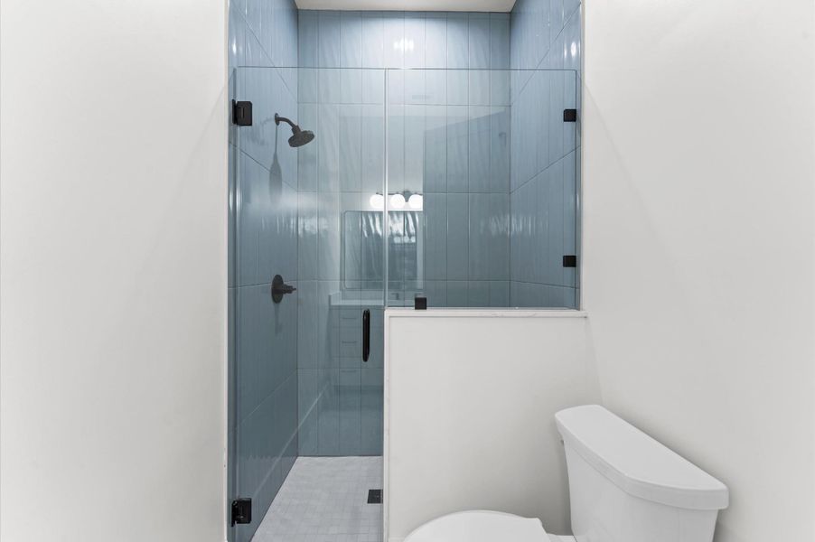 Bath 4 includes large shower and custom cabinets with Citrine quartz countertops. Bath 4 includes large shower and custom cabinets with Citrine quartz countertops.