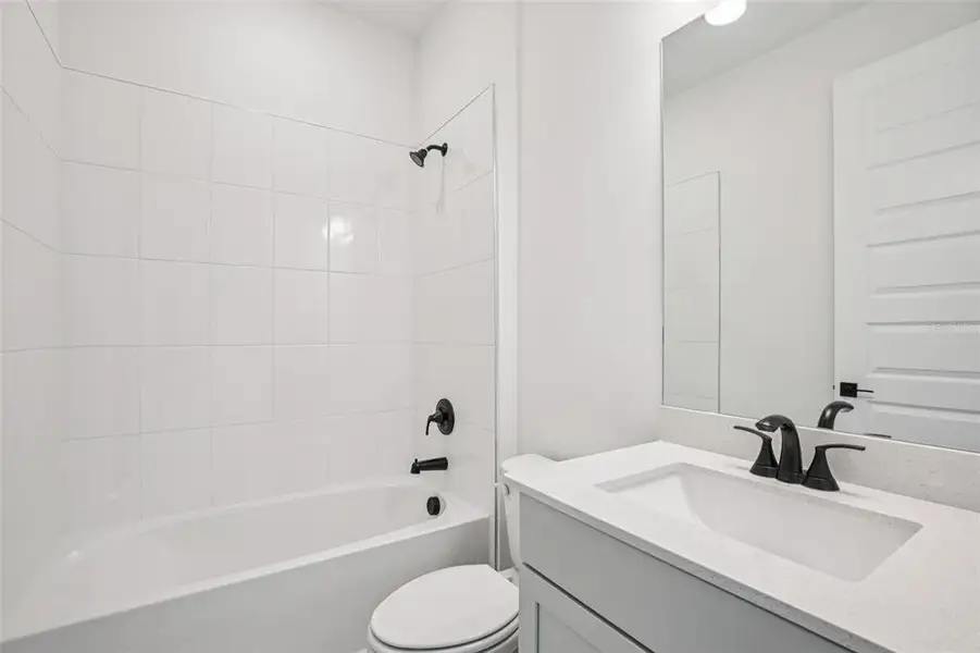 Furnished interior view inside a new home in Magnolia Bay - Reserve Series, Nokomis (Image 14).