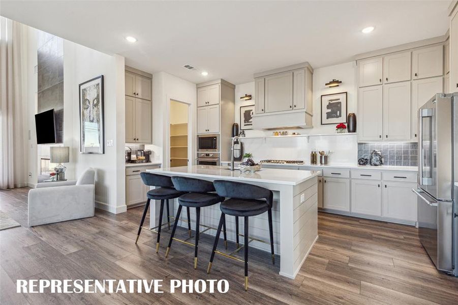 Spacious kitchens for all the chefs in the family abound in our homes at Village on Main Street!  REPRESENTATIVE PHOTO