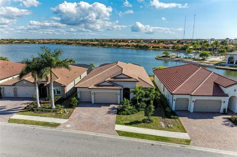 Front exterior of a new home in , Nokomis, FL, highlighting curb appeal (Image 2). Front exterior of a new home in , Nokomis, FL, highlighting curb appeal (Image 2).
