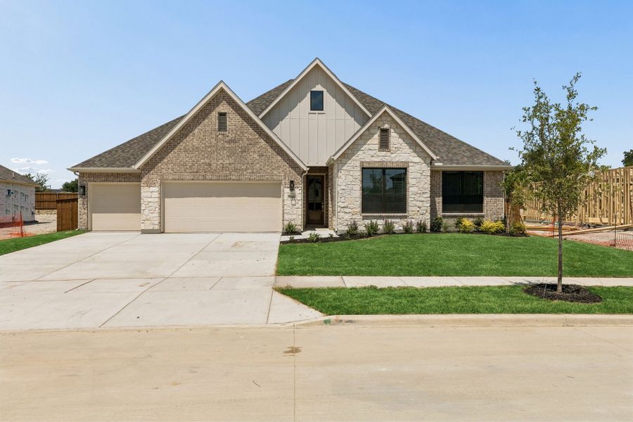 Front exterior of a new home in Rainwater Crossing, Celina, TX, highlighting curb appeal (Image 1). Front exterior of a new home in Rainwater Crossing, Celina, TX, highlighting curb appeal (Image 1).