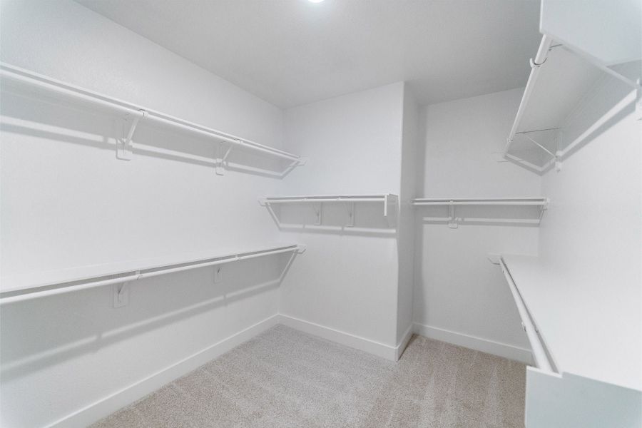 Spacious, unfurnished interior of a new home in Sunterra, Katy (Image 15).