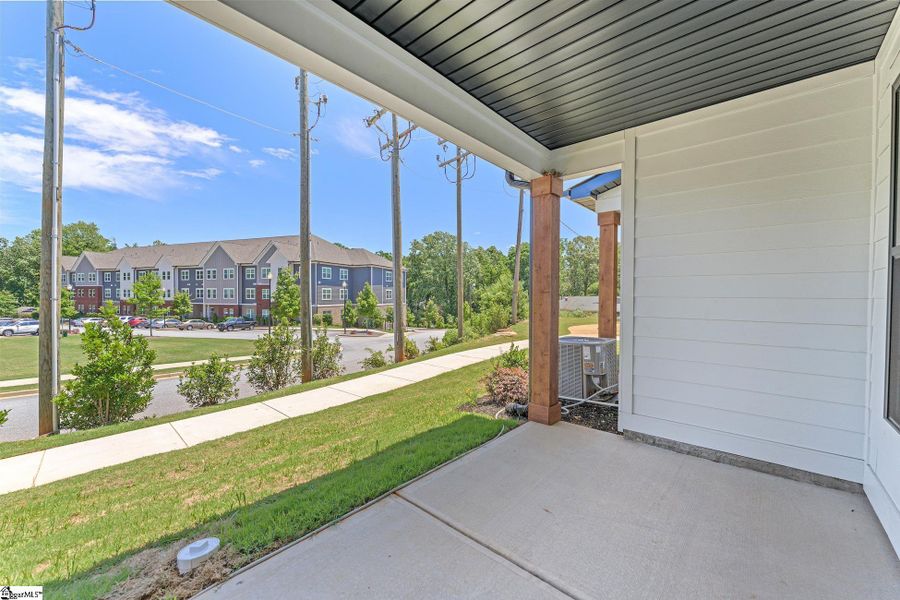 Exterior details and patio area of a home in Renaissance Place, Greenville (Image 3).