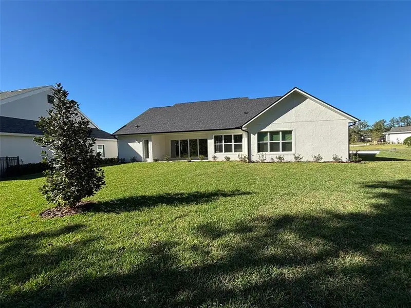 Exterior details and patio area of a home in , Brooksville (Image 14).