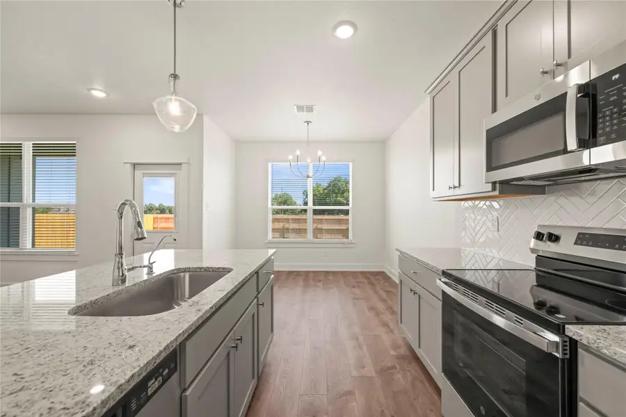 Furnished interior view inside a new home in Rancho San Gabriel, Georgetown (Image 7).