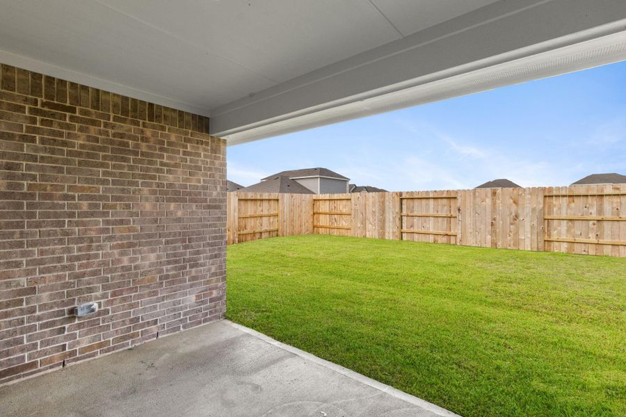 Exterior details and patio area of a home in River Ranch Trails, Dayton (Image 2).