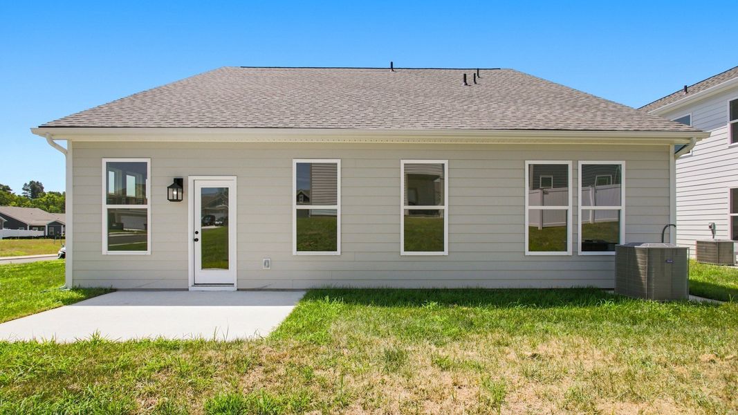 Rear of home with 10x10 concrete patio