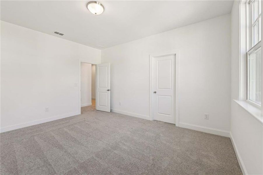 Spacious, unfurnished interior of a new home in East Harbor II at Chestatee, Dawsonville (Image 45).