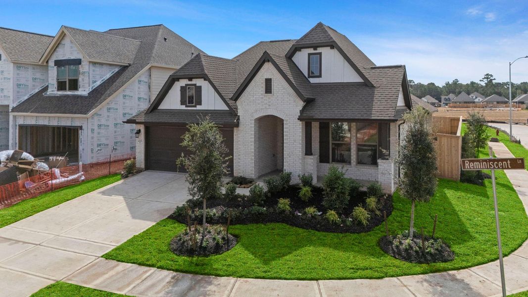 Front exterior of a new home in Escondido, Magnolia, TX, highlighting curb appeal (Image 20). Front exterior of a new home in Escondido, Magnolia, TX, highlighting curb appeal (Image 20).