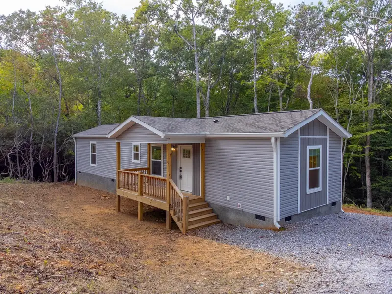 Exterior details and patio area of a home in , Hayesville (Image 2).