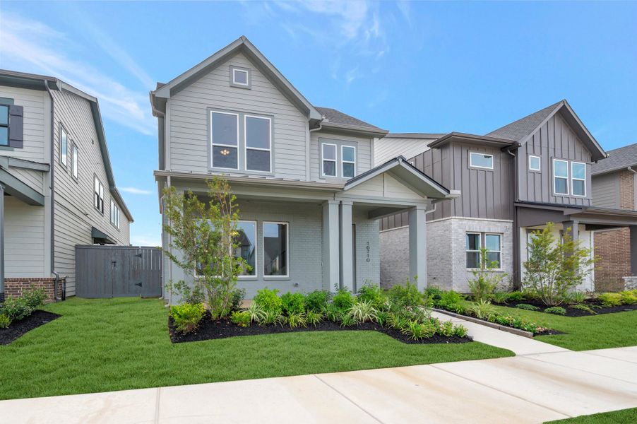 Front exterior of a new home in Jubilee - Cottages Row Collection, Hockley, TX, highlighting curb appeal (Image 28).