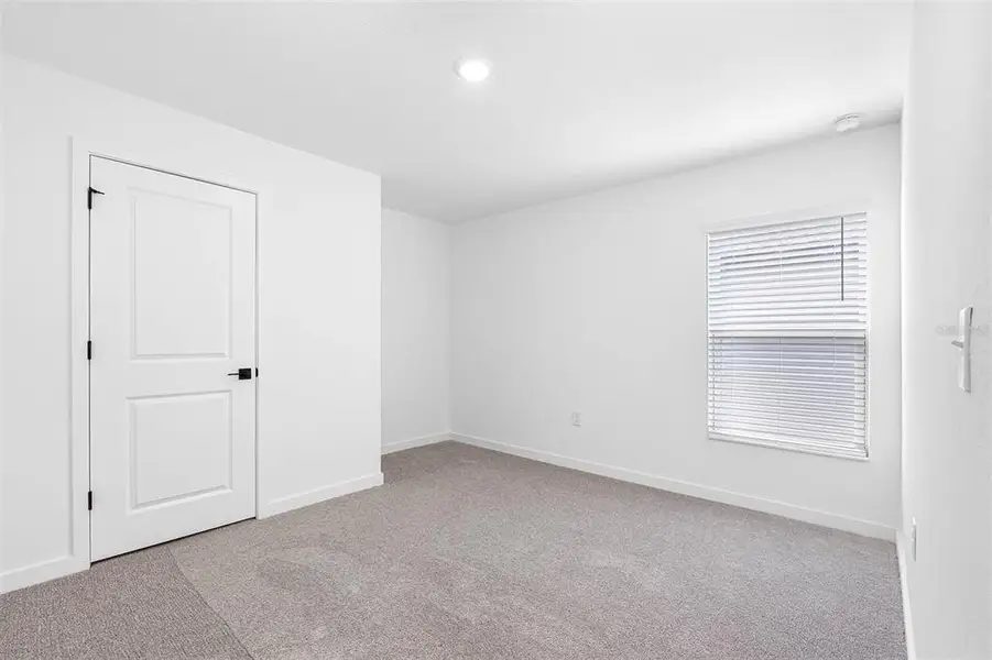 Spacious, unfurnished interior of a new home in Trilby Crossing, Brooksville (Image 9).