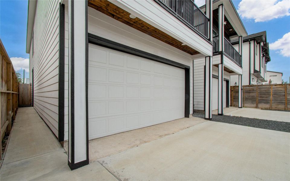 Welcome Home! Modern two-story home with a sleek black-and-white exterior, ideal for contemporary living.