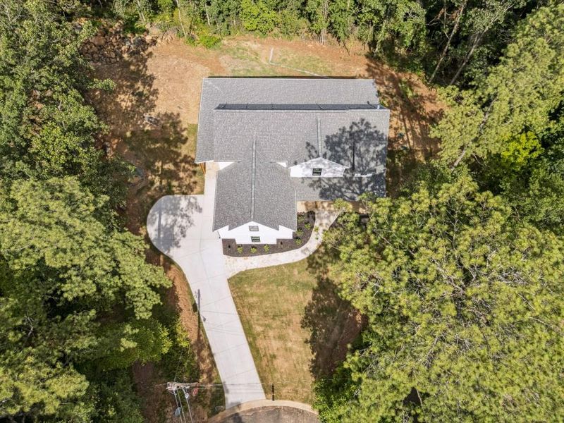 Front exterior of a new home in , Woodstock, GA, highlighting curb appeal (Image 25).