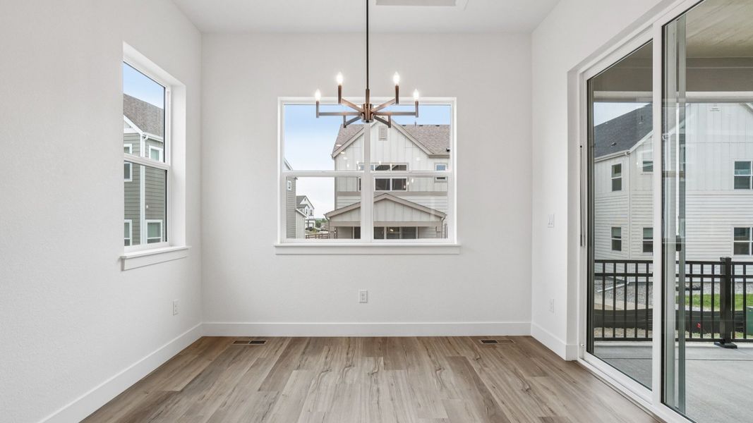 Furnished interior view inside a new home in Dillon Pointe - Journey, Broomfield (Image 9).