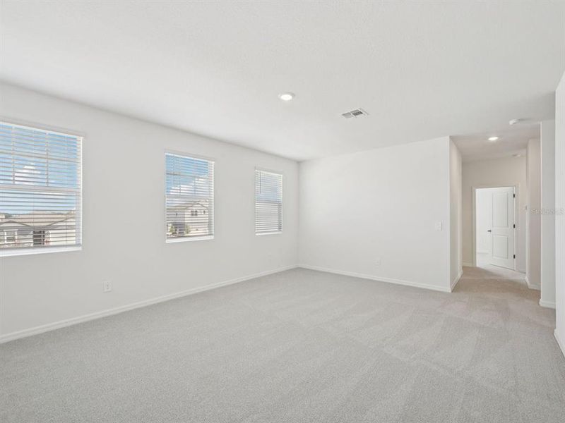 Spacious, unfurnished interior of a new home in Coasterra - Reserve Series, Palmetto (Image 12).