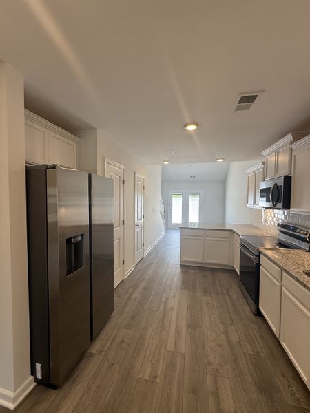 Furnished interior view inside a new home in Legacy Fields, Pleasant View (Image 5).