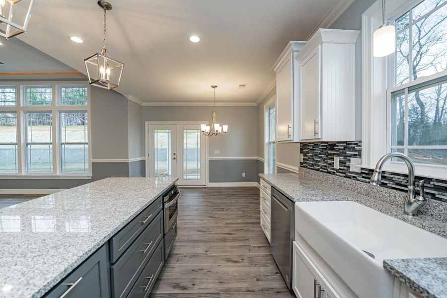 Representative furnished interior of a home built from the Roosevelt Elite by Enchanted Homes in Pointe Summit, Slater-Marietta (Image 12).