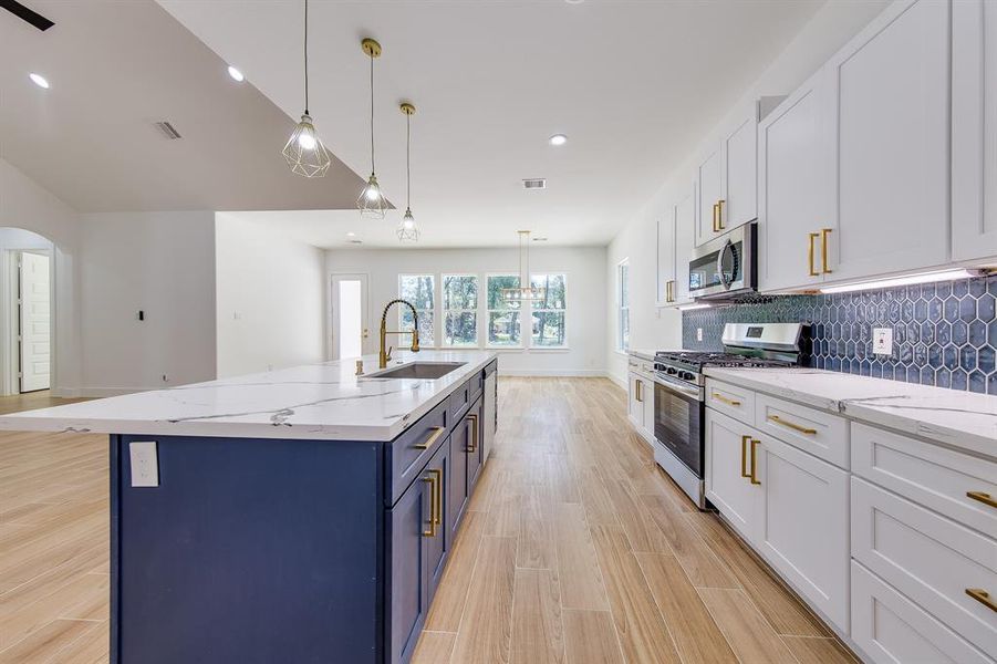 Whether you’re whipping up a quick breakfast or crafting a gourmet feast, this kitchen inspires you to love every moment spent here.